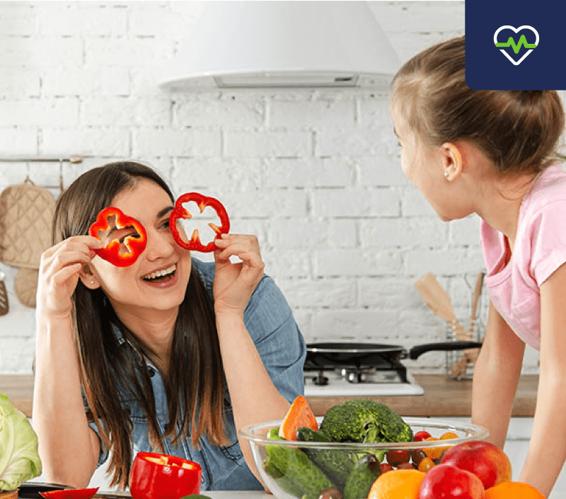 A family eating healthy vegetables to gain vital vitamins